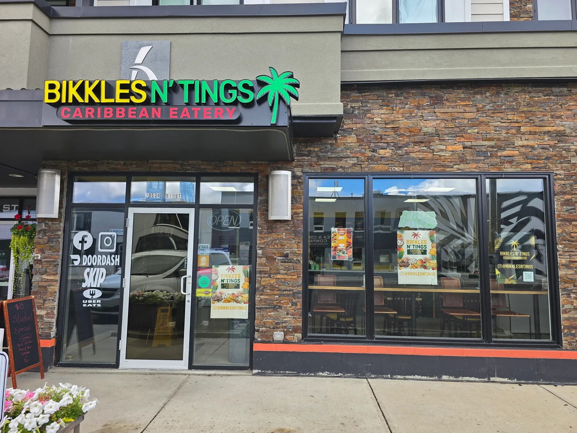 Caribbean plates and curries served at Bikkles N’ Tings Caribbean Eatery in Edmonton, AB